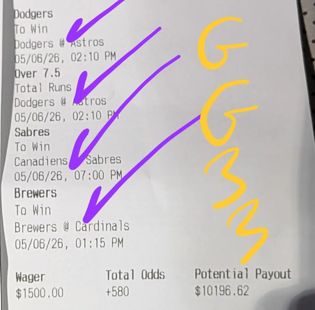 Marked four-leg parlay ticket with circled potential payout